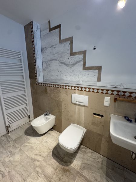 Einzigartiges Loft-Juwel: Historische Remise mit 3m Gewölbe, Kamin & eigenem Garten Bild 7