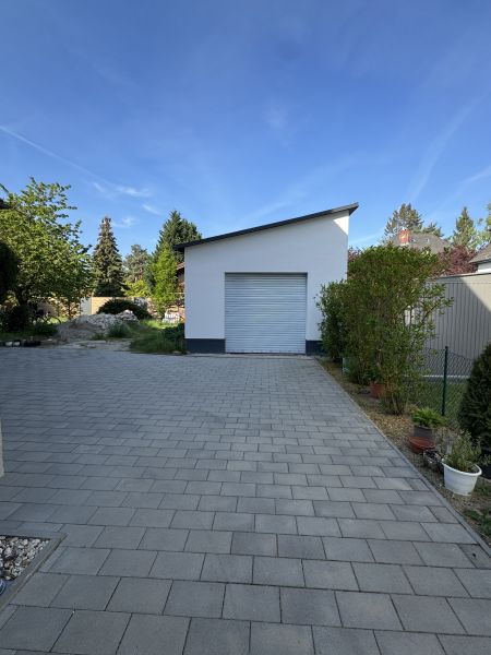 Freistehende 40 qm Einzelgarage mit Freifläche und Garten in Falkensee mieten Bild 0