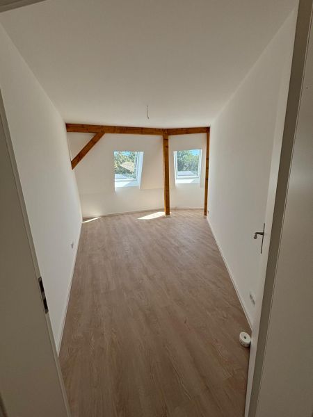 Erstbezug: 3 Zimmer-Dachgeschosswohnung Nähe Bahnhof - Photo 5
